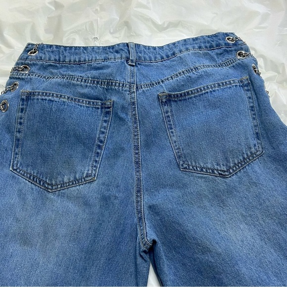 Forever21 denim blue jeans with grommets and chains on each side. - Picture 6 of 6